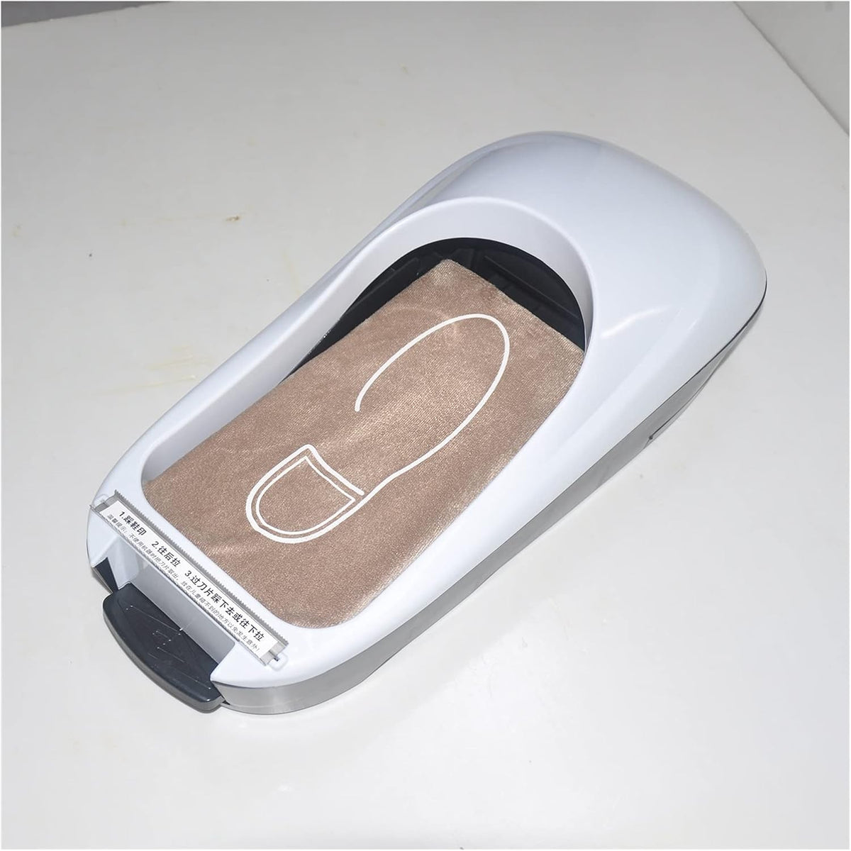 Car-Style Shoe Cover Dispenser ©